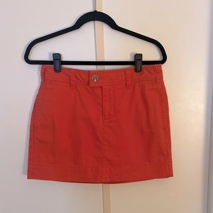 Orange mini skirt in khaki material